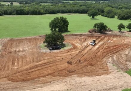 tractor digging foundation