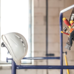 helmet and other builder's accessories in empty room