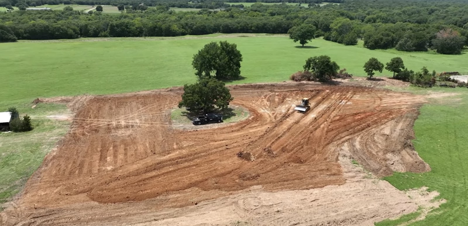 tractor digging foundation